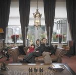 19-12-2003 Robert and Monique Schoemacher at home in Scheveningen.

[keywords]Posed: Full Length, Eyecontact, Livingroom, Plastic Surgeon[/keywords]